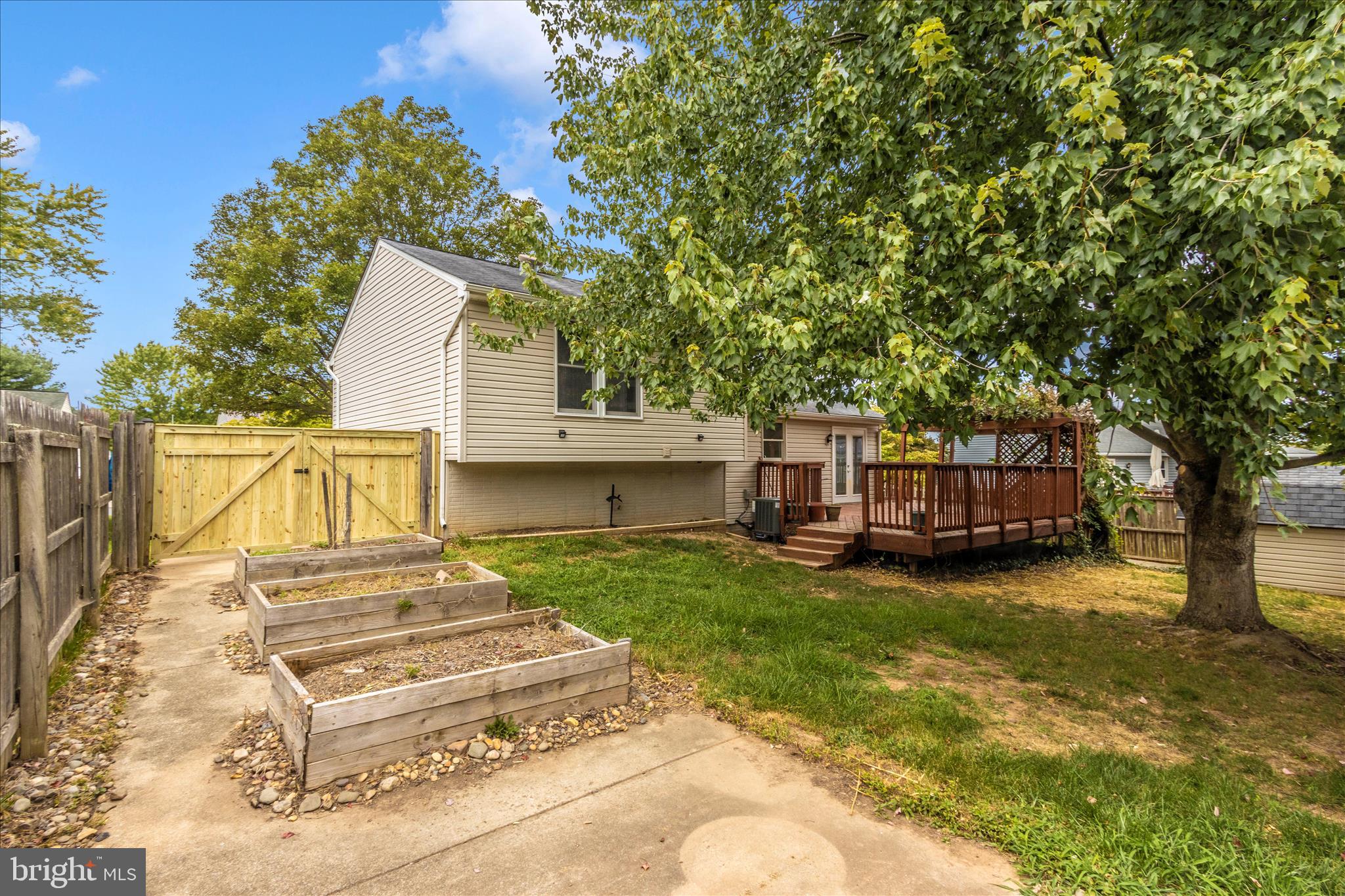 207 Contour Road Mount Airy, MD 21771 - Photo 49 of 52 a view of a house with backyard and sitting area
