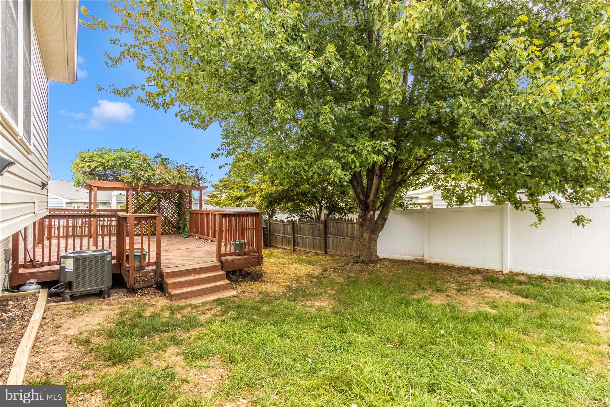 207 Contour Road Mount Airy, MD 21771 - Photo 51 of 52 a view of a house with a yard