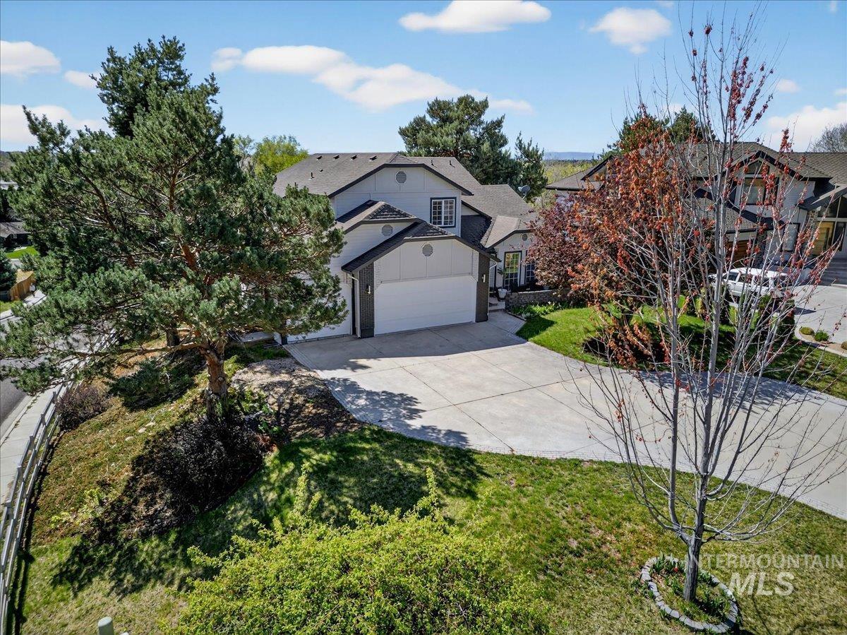 398 Pebble Beach Way Eagle, ID 83616 - Photo 2 of 35 Modern residence featuring a multi-level design and a two-car garage