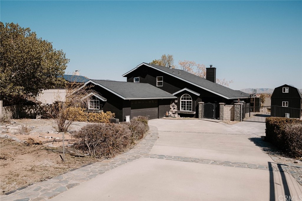 21208 Quail Springs Road Tehachapi, CA 93561 - Photo 1 of 1 a house view with a outdoor space