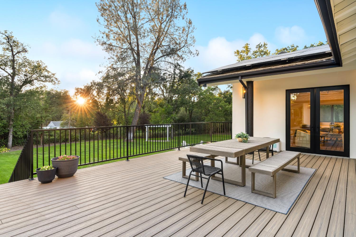 7697 Horseshoe Bar Road Loomis, CA 95650 - Photo 57 of 76 a view of a roof deck with couches chairs and wooden floor