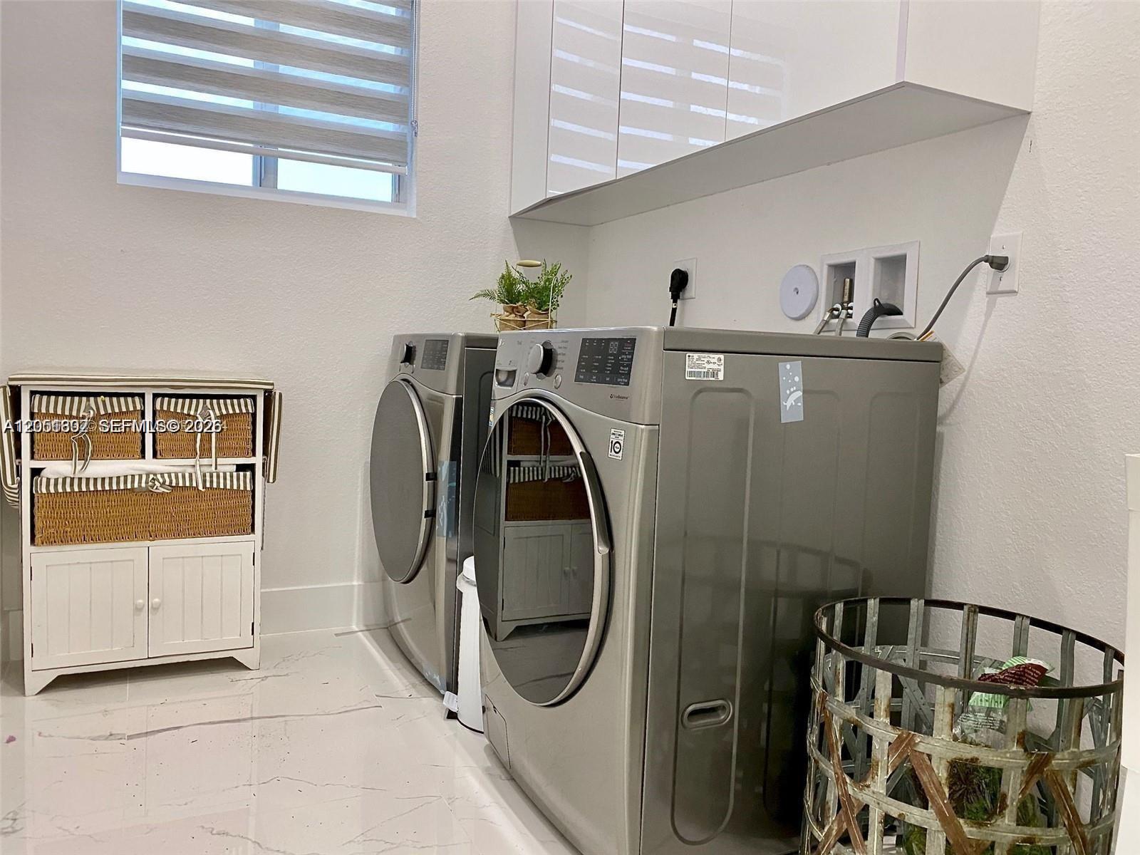 17575 Southwest 280th Street Homestead, FL 33031 - Photo 20 of 50 a utility room with dryer and washer