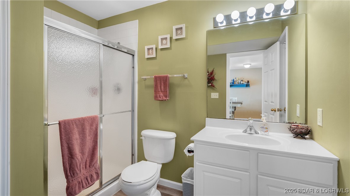 108 Park Pl Drive, Unit 1B Kaiser, MO 65047 - Photo 14 of 28 Guest Bath with Walk-in Shower and Linen Closet.