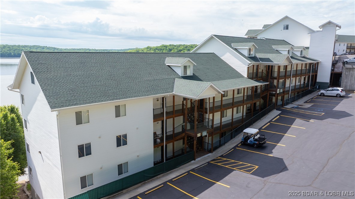 108 Park Pl Drive, Unit 1B Kaiser, MO 65047 - Photo 20 of 28 No steps into unit and boat dock...via elevator!