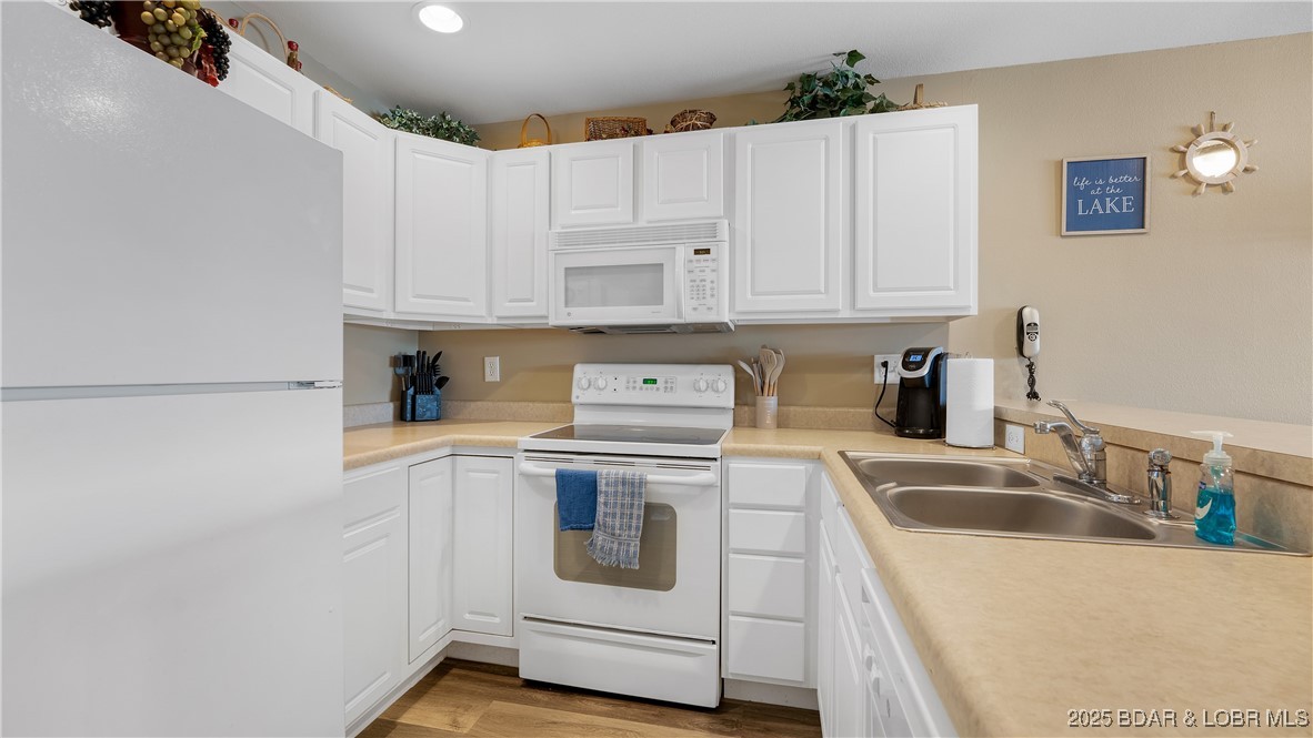 108 Park Pl Drive, Unit 1B Kaiser, MO 65047 - Photo 9 of 28 Plenty of kitchen storage for all the things you n