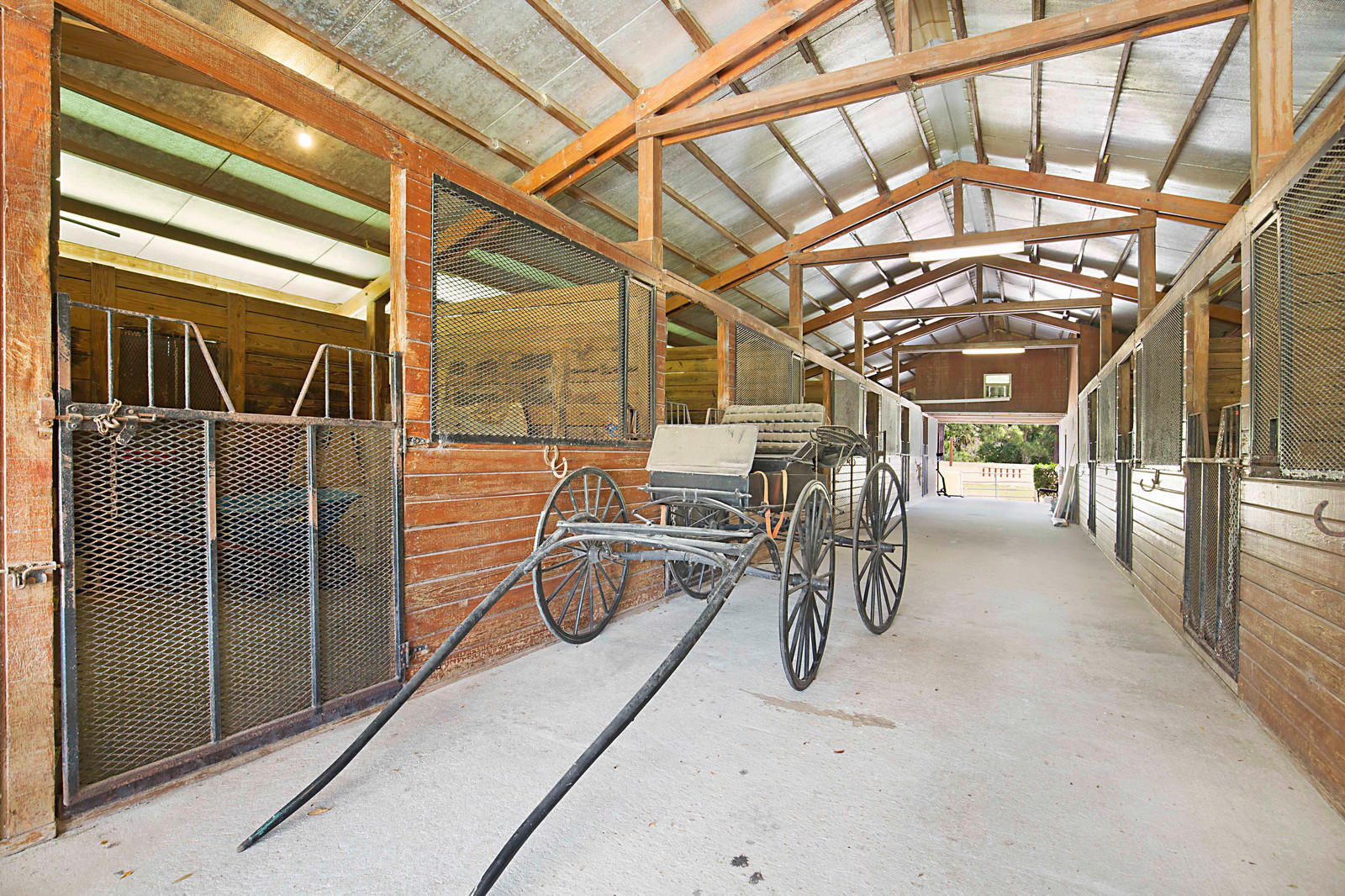 2880 B Road Loxahatchee, FL 33470 - Photo 36 of 52 10 STALL CEBTER AISLE BARN