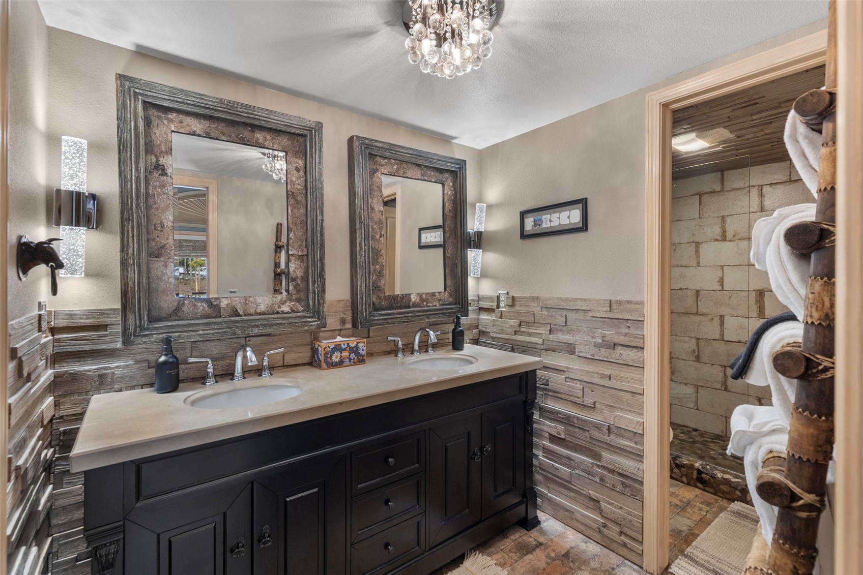 14 Larson Lane, Unit B Frisco, CO 80443 - Photo 15 of 40 a bathroom with a double vanity sink mirror and