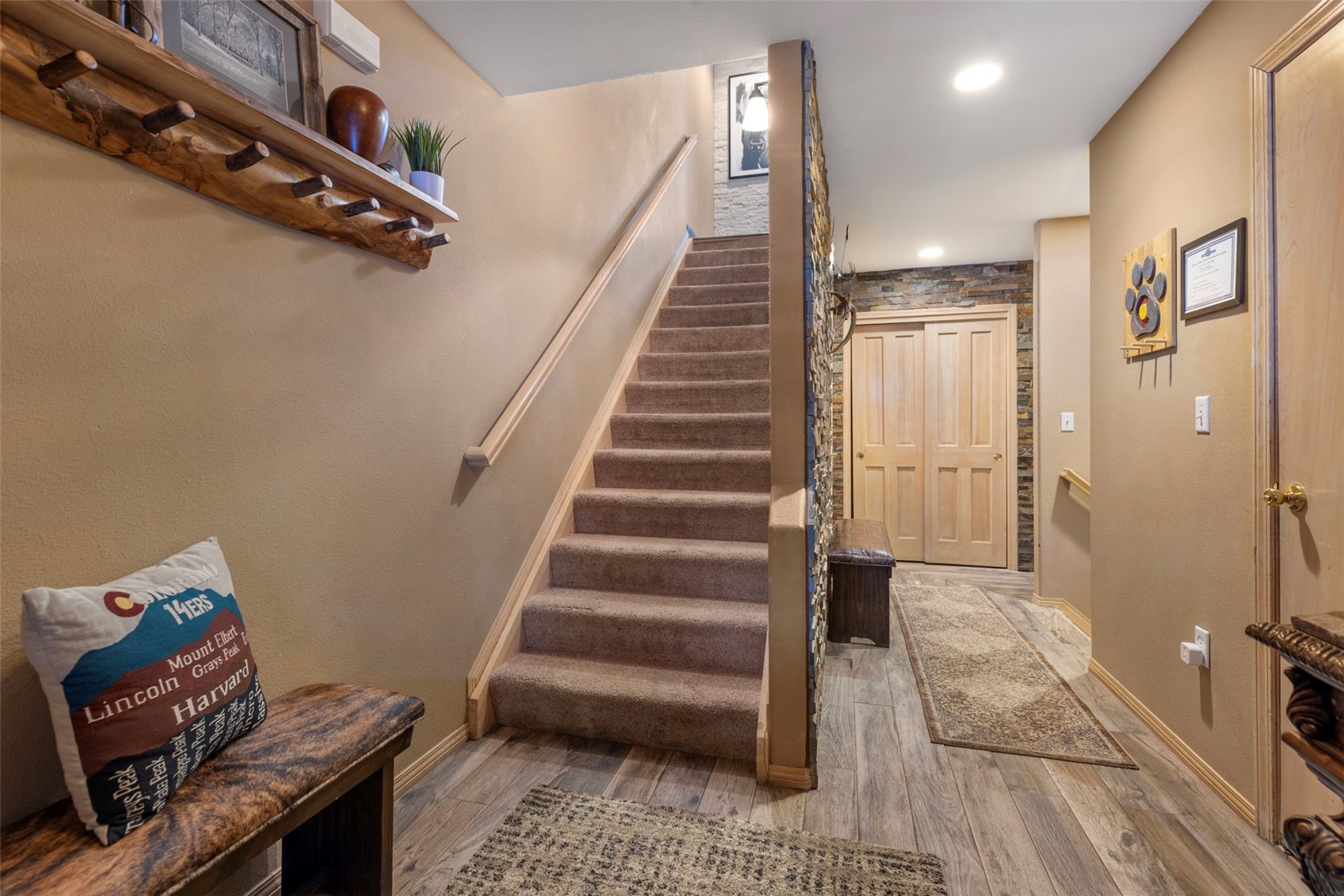 14 Larson Lane, Unit B Frisco, CO 80443 - Photo 16 of 40 a view of a hallway with staircase