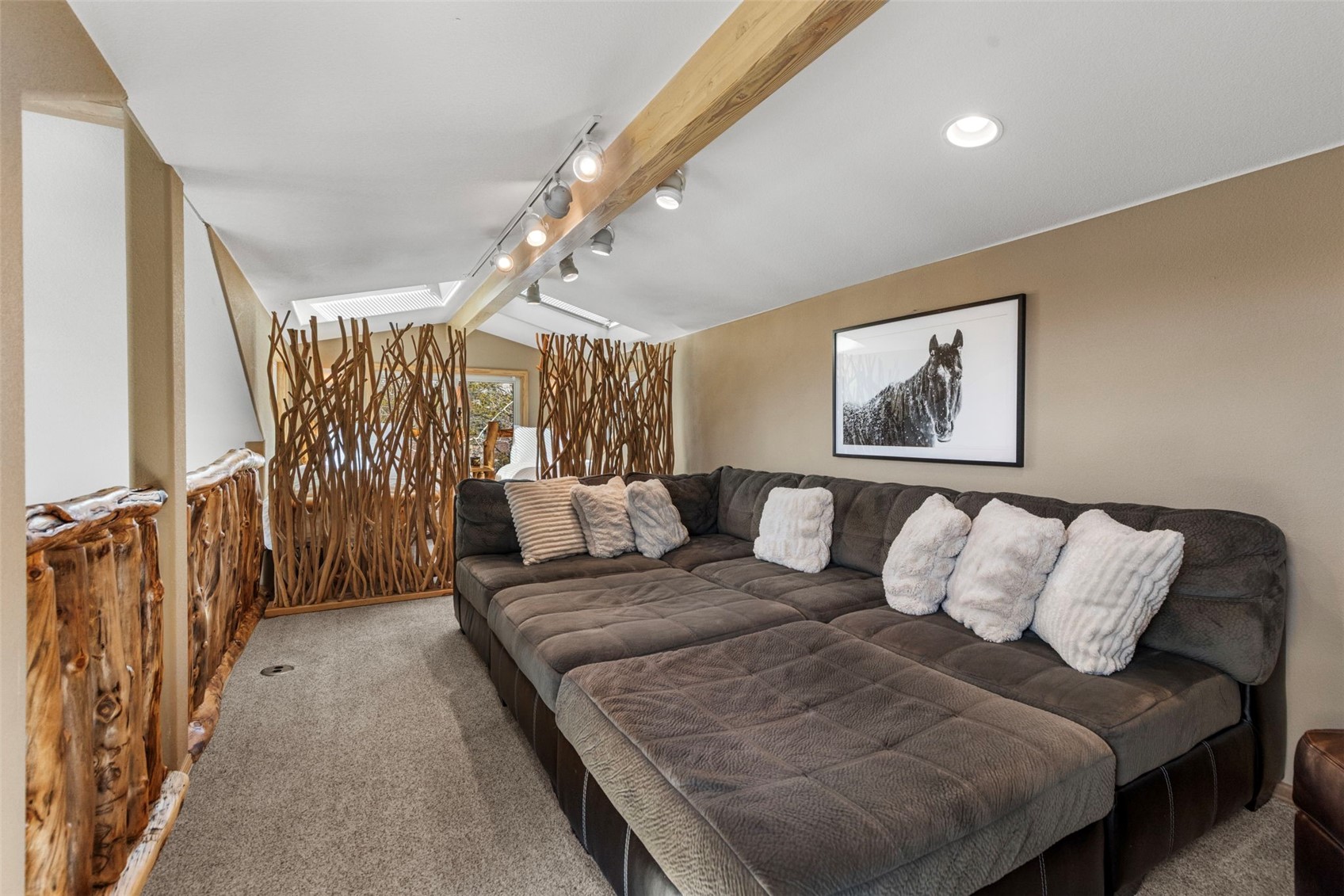 14 Larson Lane, Unit B Frisco, CO 80443 - Photo 23 of 40 a bedroom with a bed and a painting on the wall