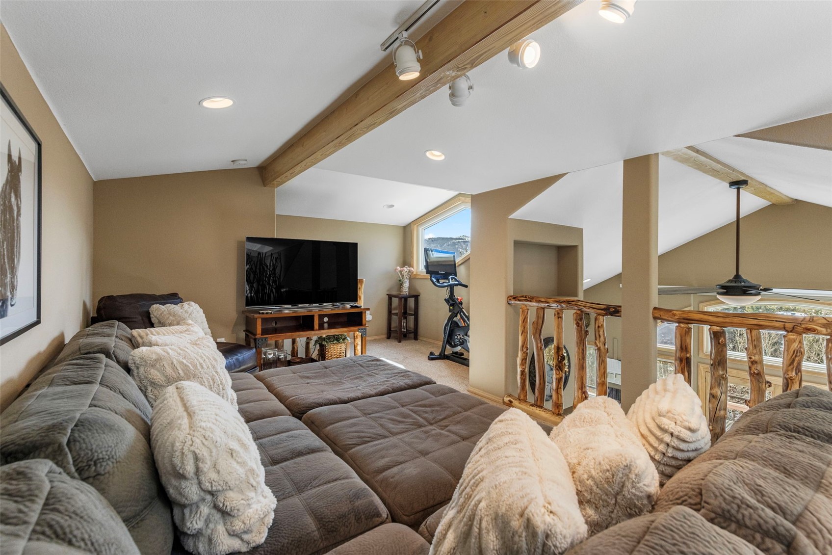 14 Larson Lane, Unit B Frisco, CO 80443 - Photo 24 of 40 a living room with furniture and a flat screen tv