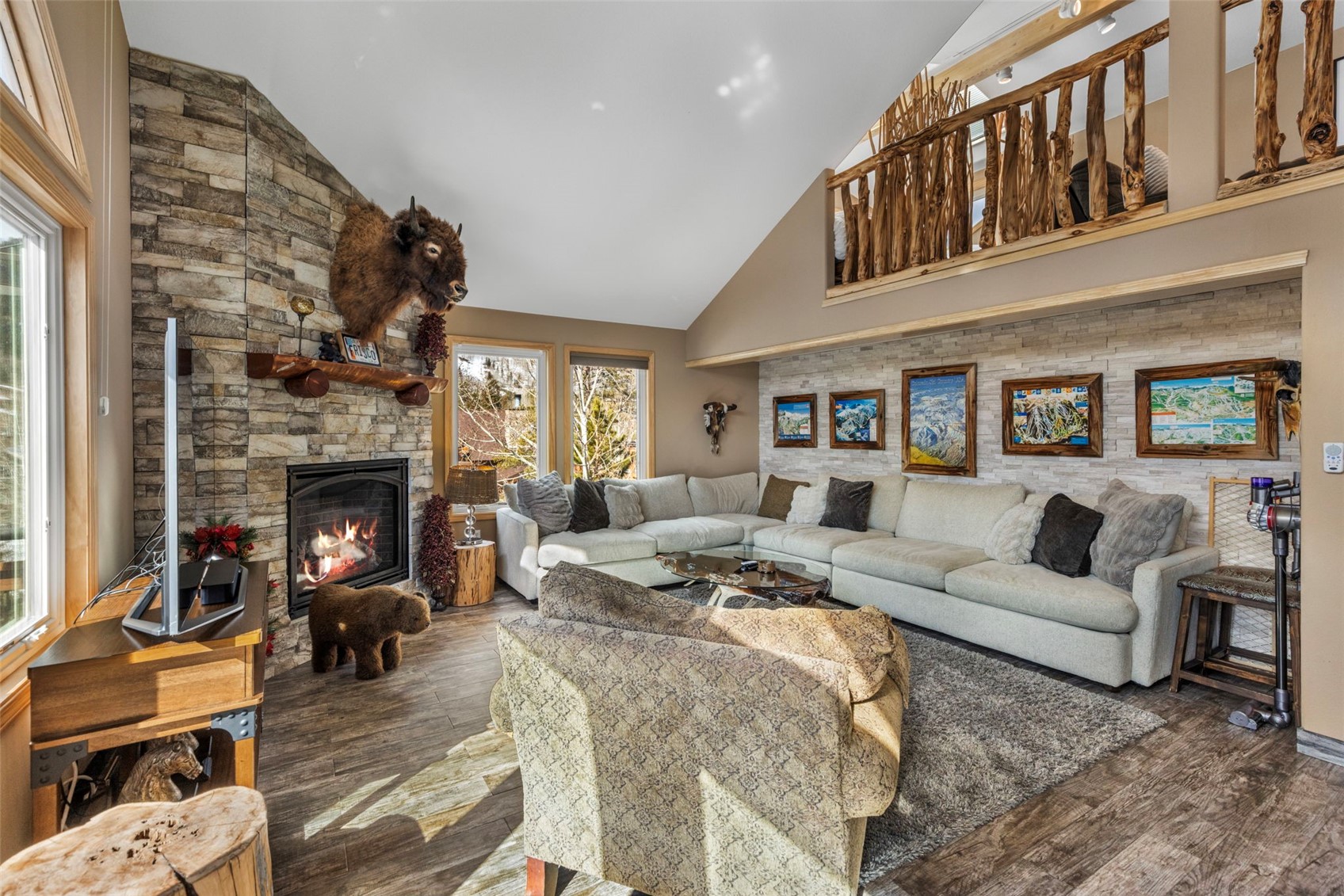 14 Larson Lane, Unit B Frisco, CO 80443 - Photo 3 of 40 a living room with furniture and a fireplace