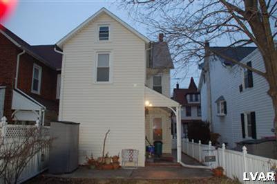 214 East Garrison Street Bethlehem, PA 18018 - Photo 2 of 11 a front view of a house with garage
