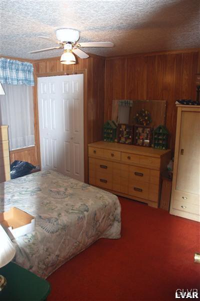 214 East Garrison Street Bethlehem, PA 18018 - Photo 9 of 11 a bedroom with a bed and a dresser