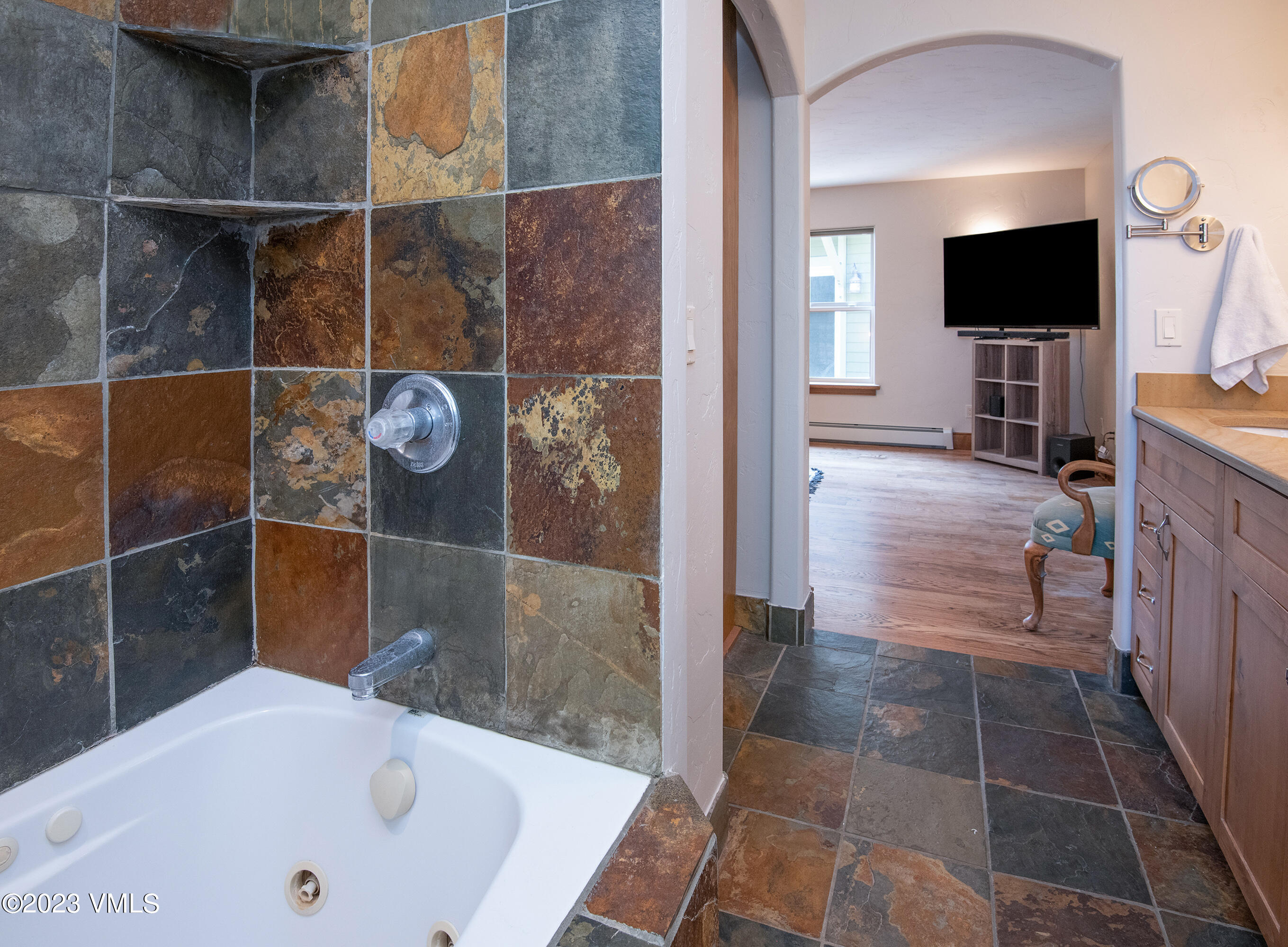 686 Mesa Drive Eagle, CO 81631 - Photo 27 of 73 a bathroom with a tub and a shower