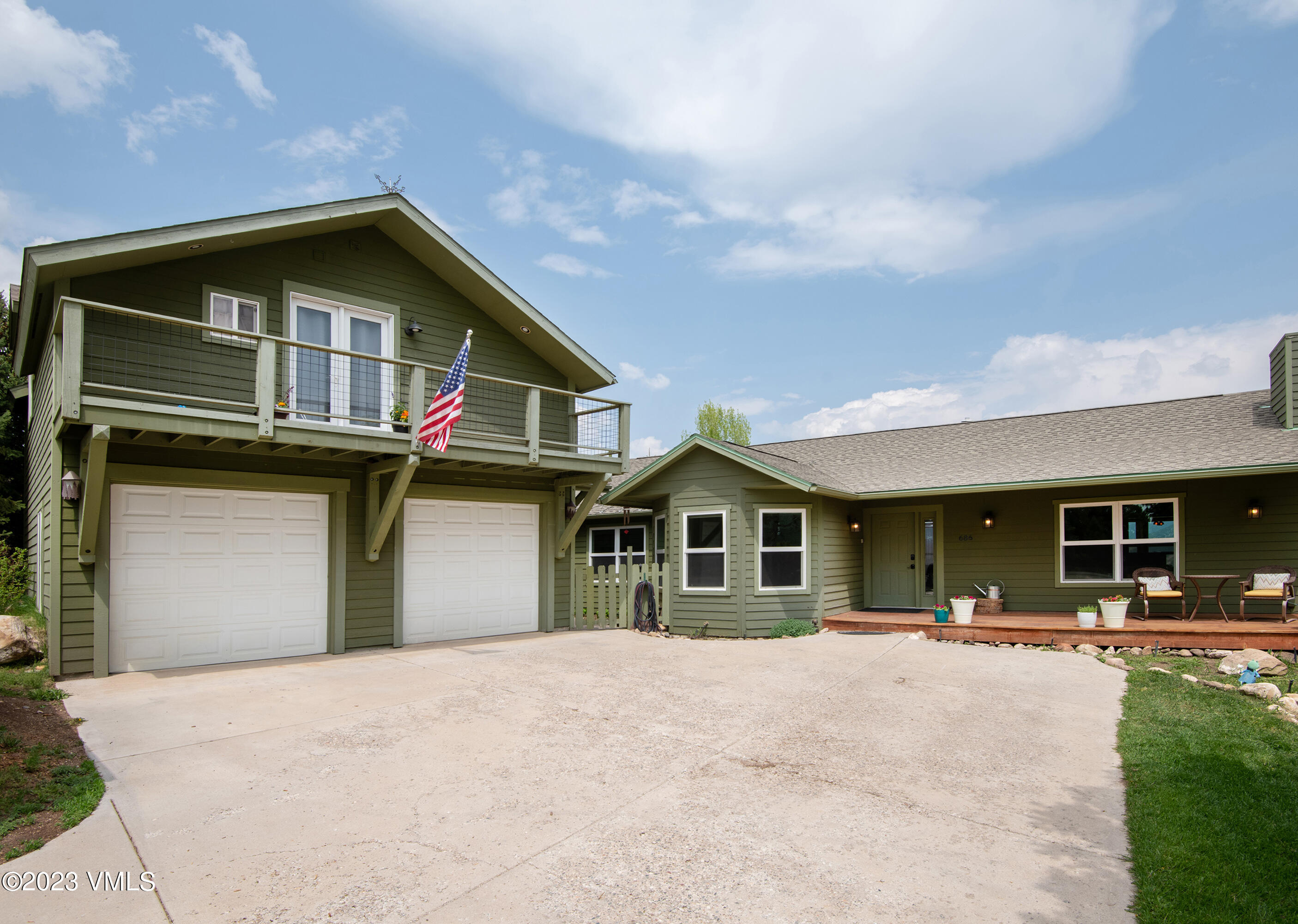 686 Mesa Drive Eagle, CO 81631 - Photo 3 of 73 a front view of a house with a yard