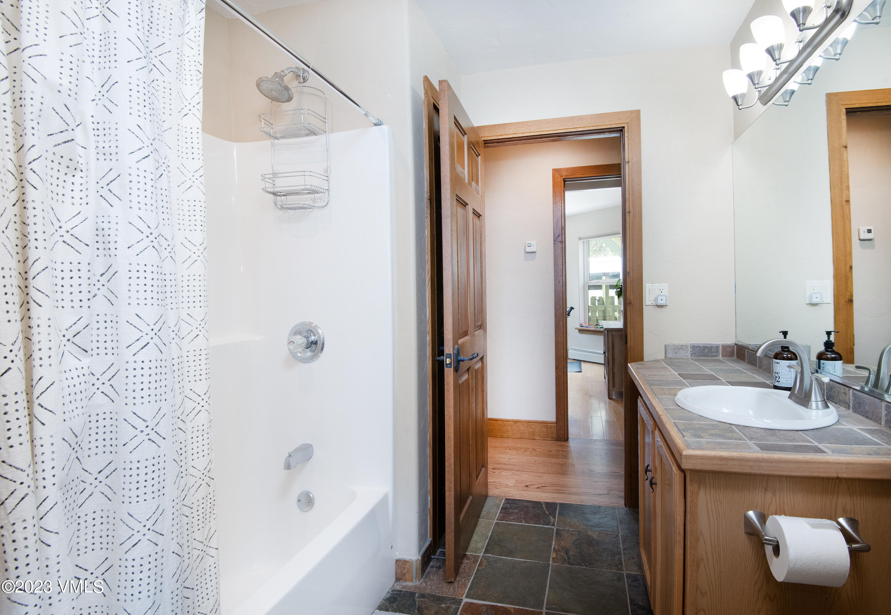 686 Mesa Drive Eagle, CO 81631 - Photo 32 of 73 a bathroom with a sink and a mirror