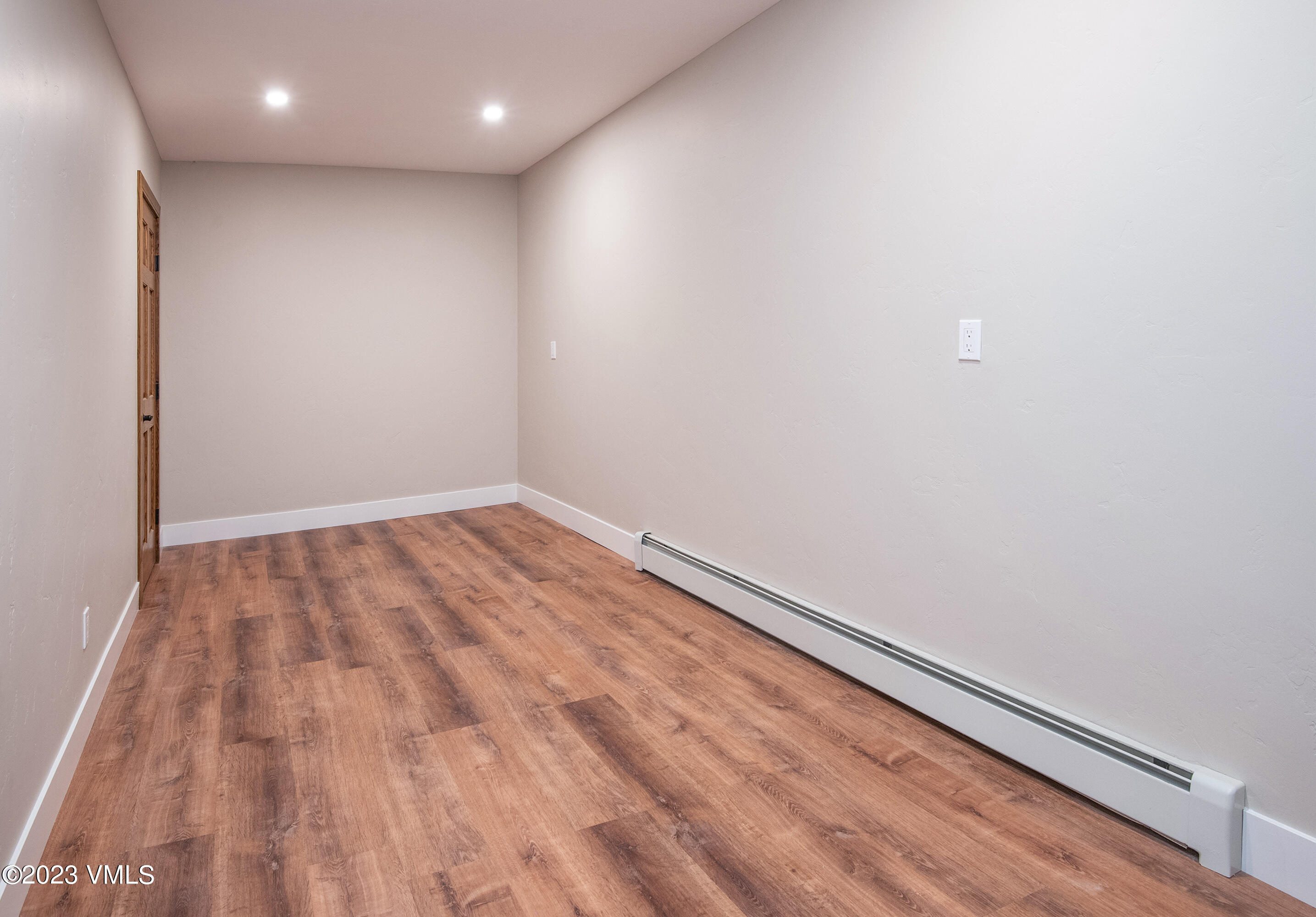 686 Mesa Drive Eagle, CO 81631 - Photo 45 of 73 a view of empty room with wooden floor