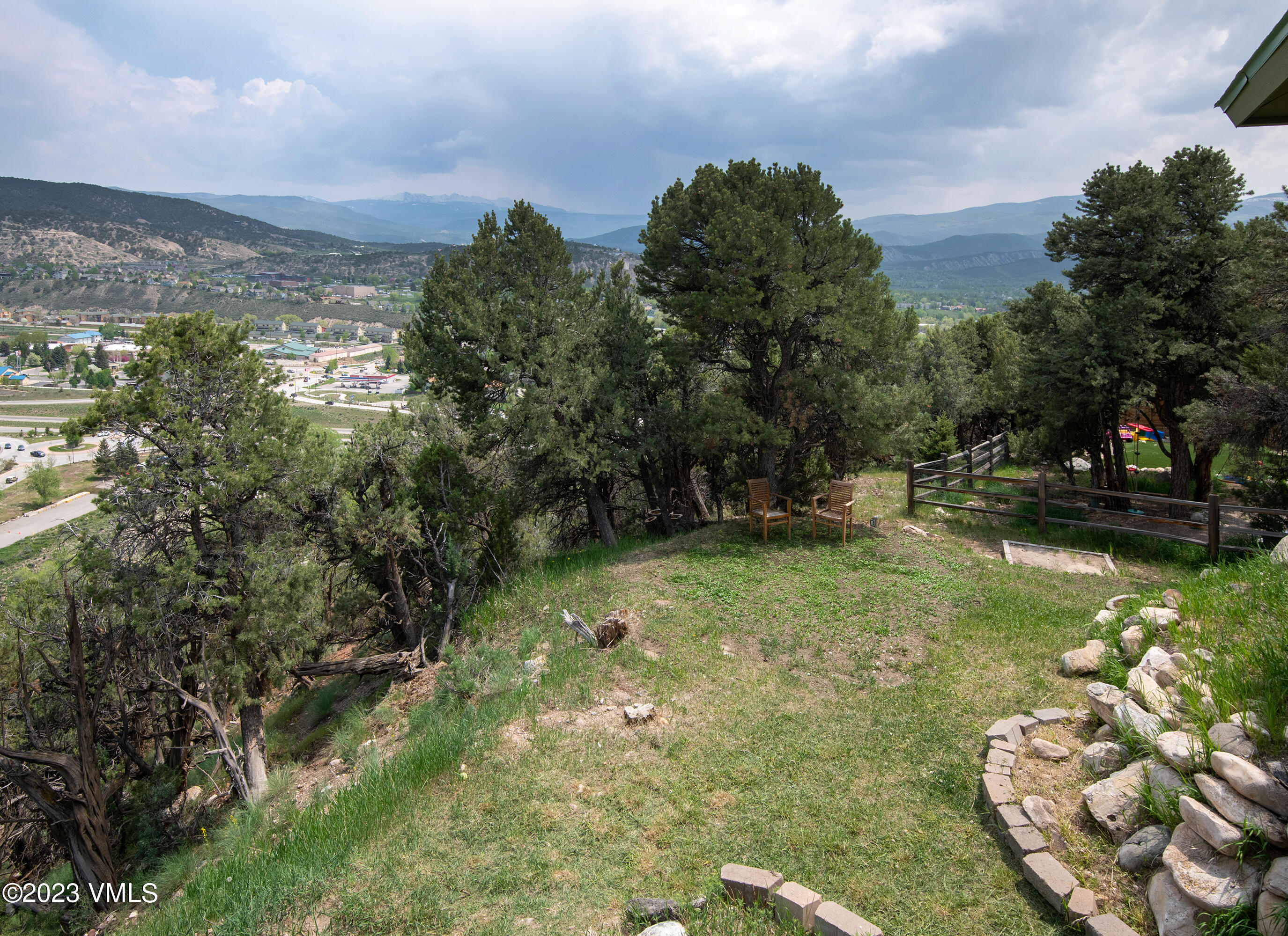 686 Mesa Drive Eagle, CO 81631 - Photo 50 of 73 a view of a garden with a building in the background