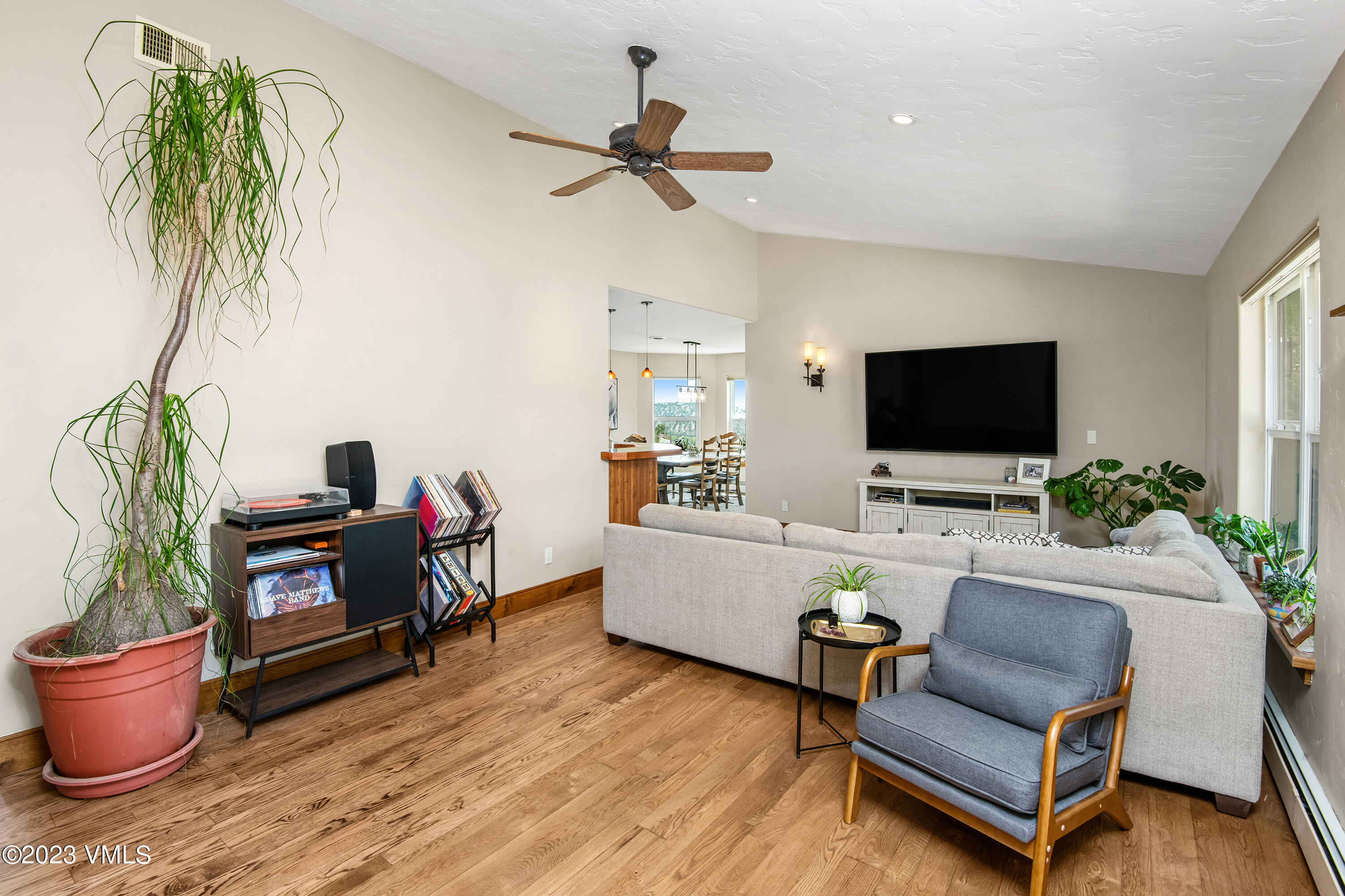 686 Mesa Drive Eagle, CO 81631 - Photo 5 of 73 a living room with furniture and a flat screen tv