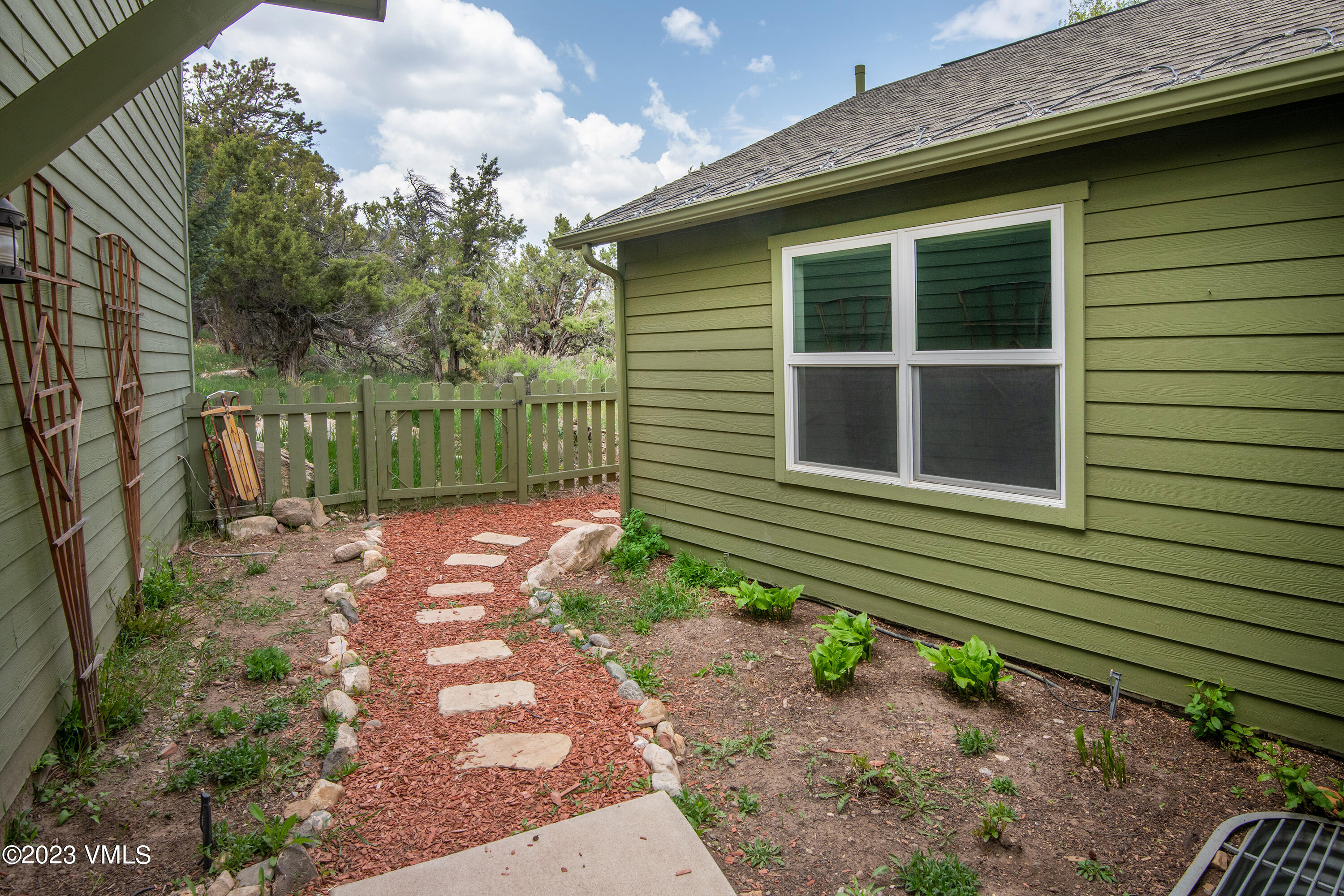 686 Mesa Drive Eagle, CO 81631 - Photo 56 of 73 a front view of a house with a yard