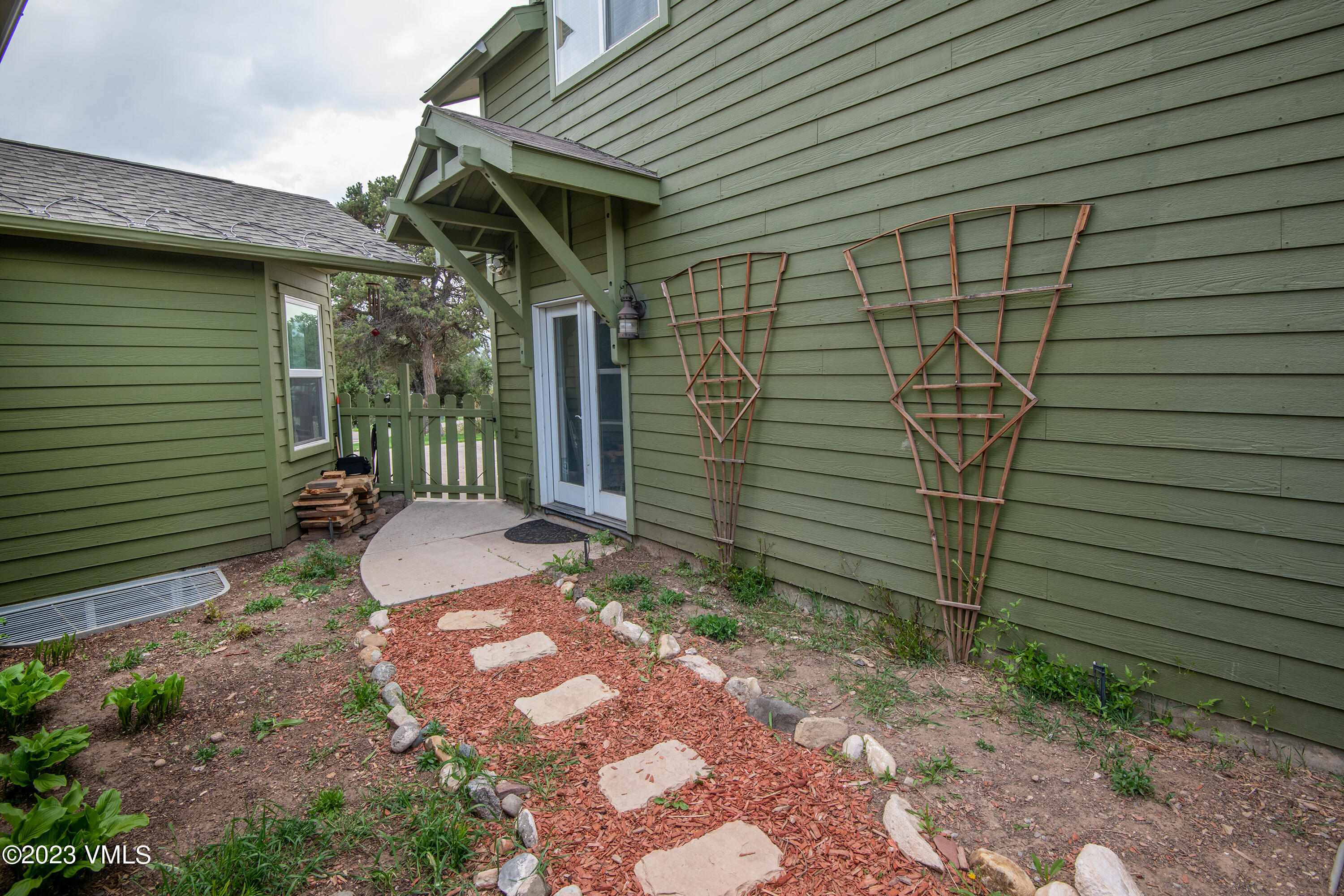 686 Mesa Drive Eagle, CO 81631 - Photo 57 of 73 Side Yard / Lock Off Entrance