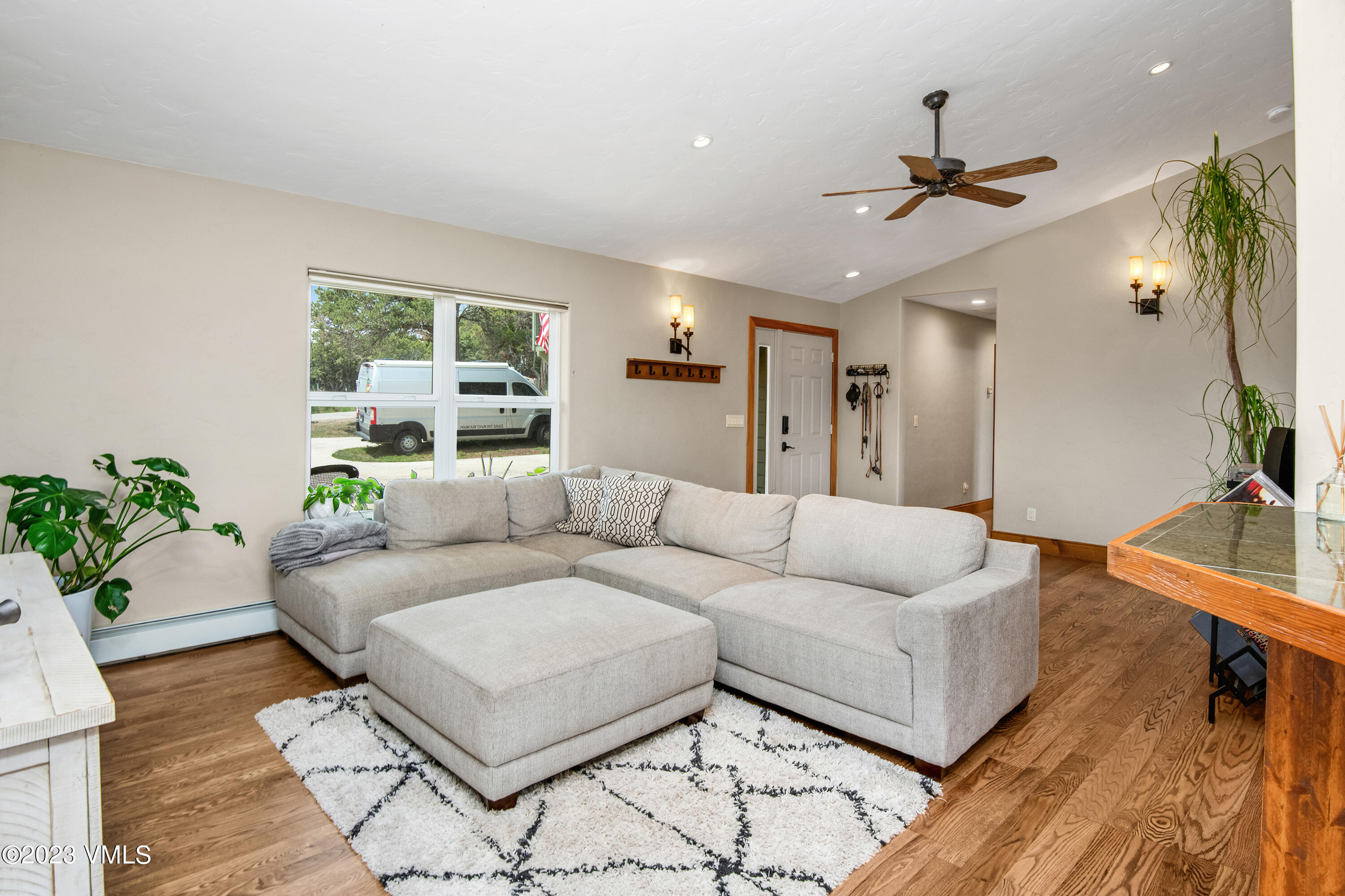 686 Mesa Drive Eagle, CO 81631 - Photo 6 of 73 a living room with furniture and a large window