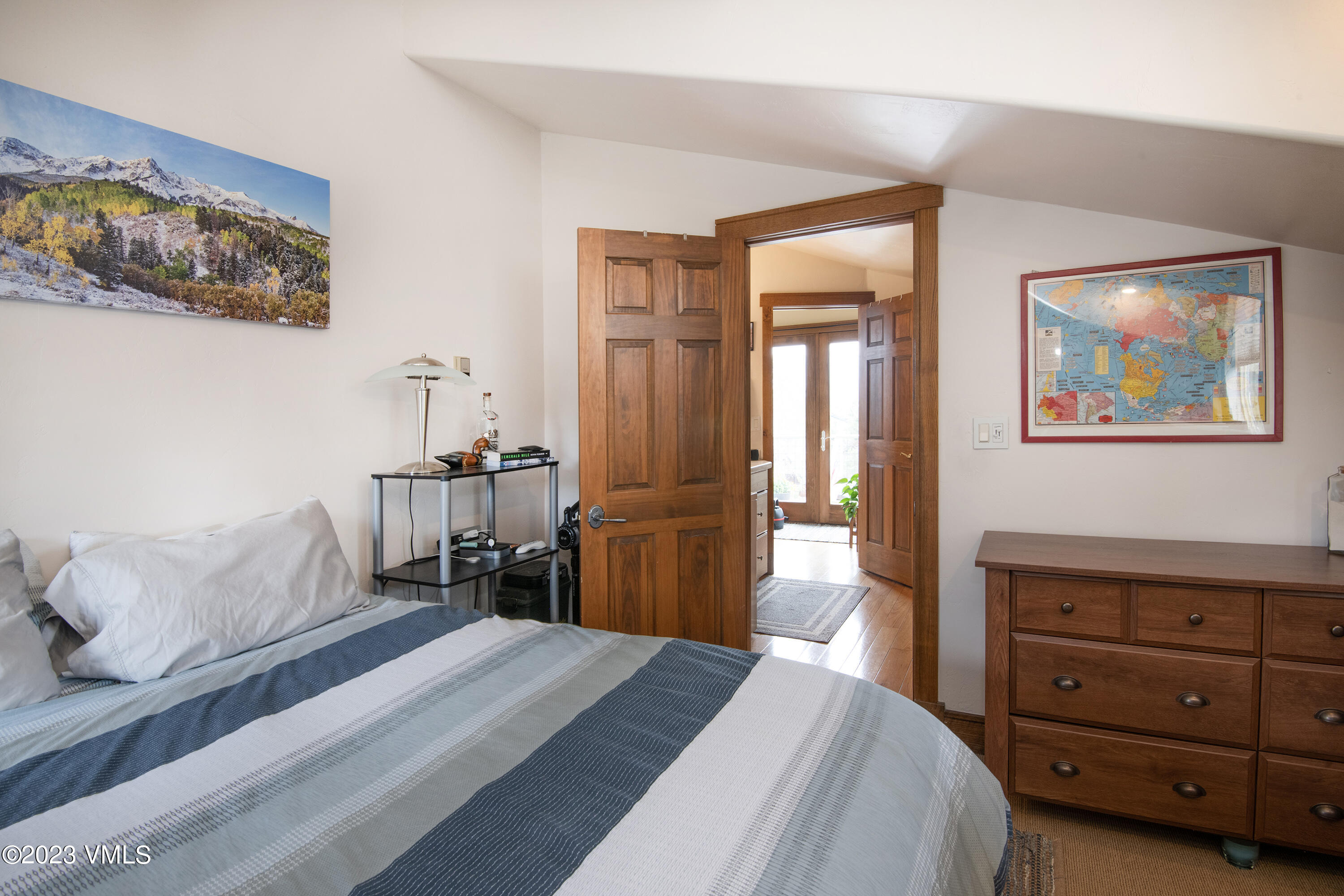 686 Mesa Drive Eagle, CO 81631 - Photo 65 of 73 a bedroom with a bed and a dresser