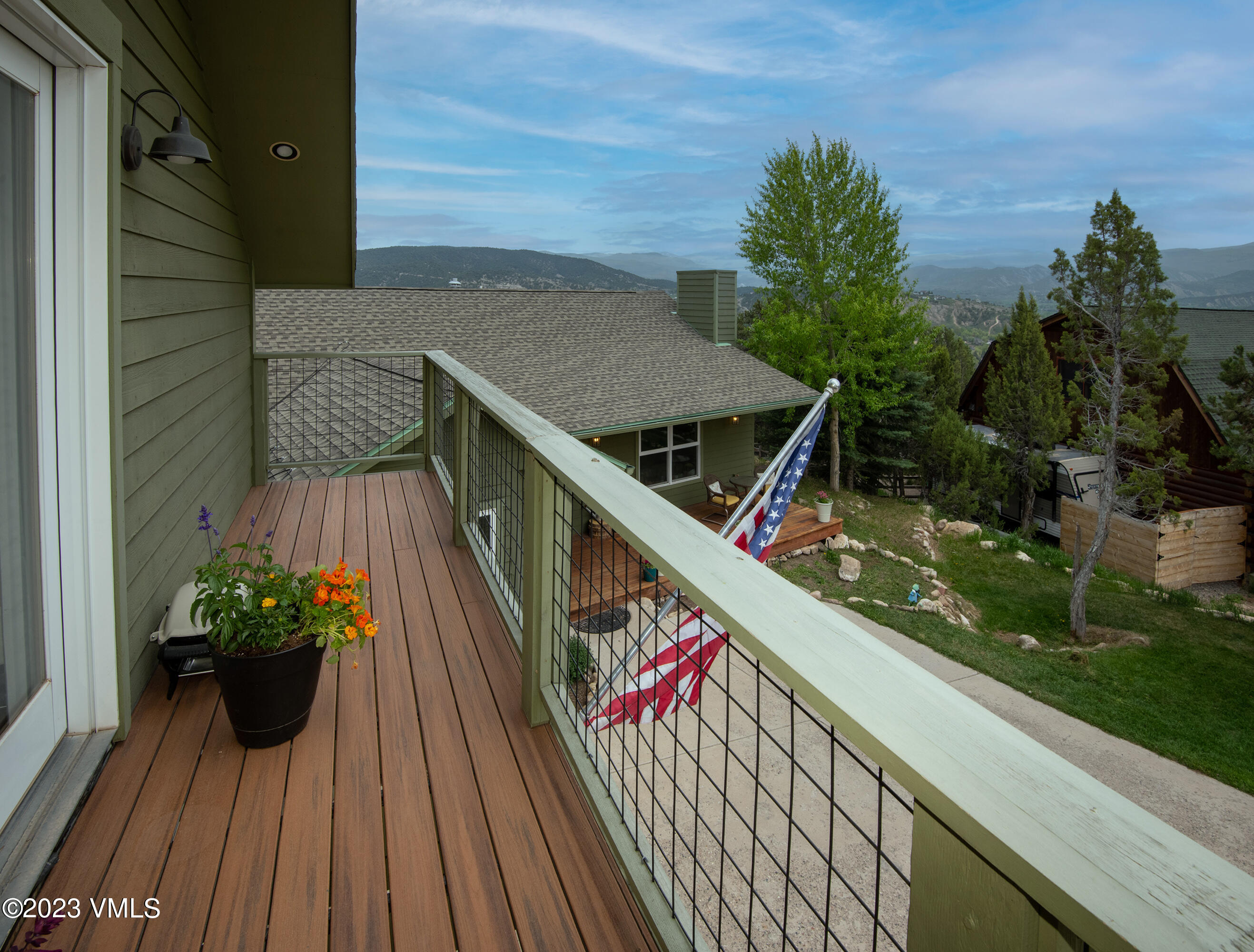 686 Mesa Drive Eagle, CO 81631 - Photo 70 of 73 a view of a balcony with wooden floor and potted plants