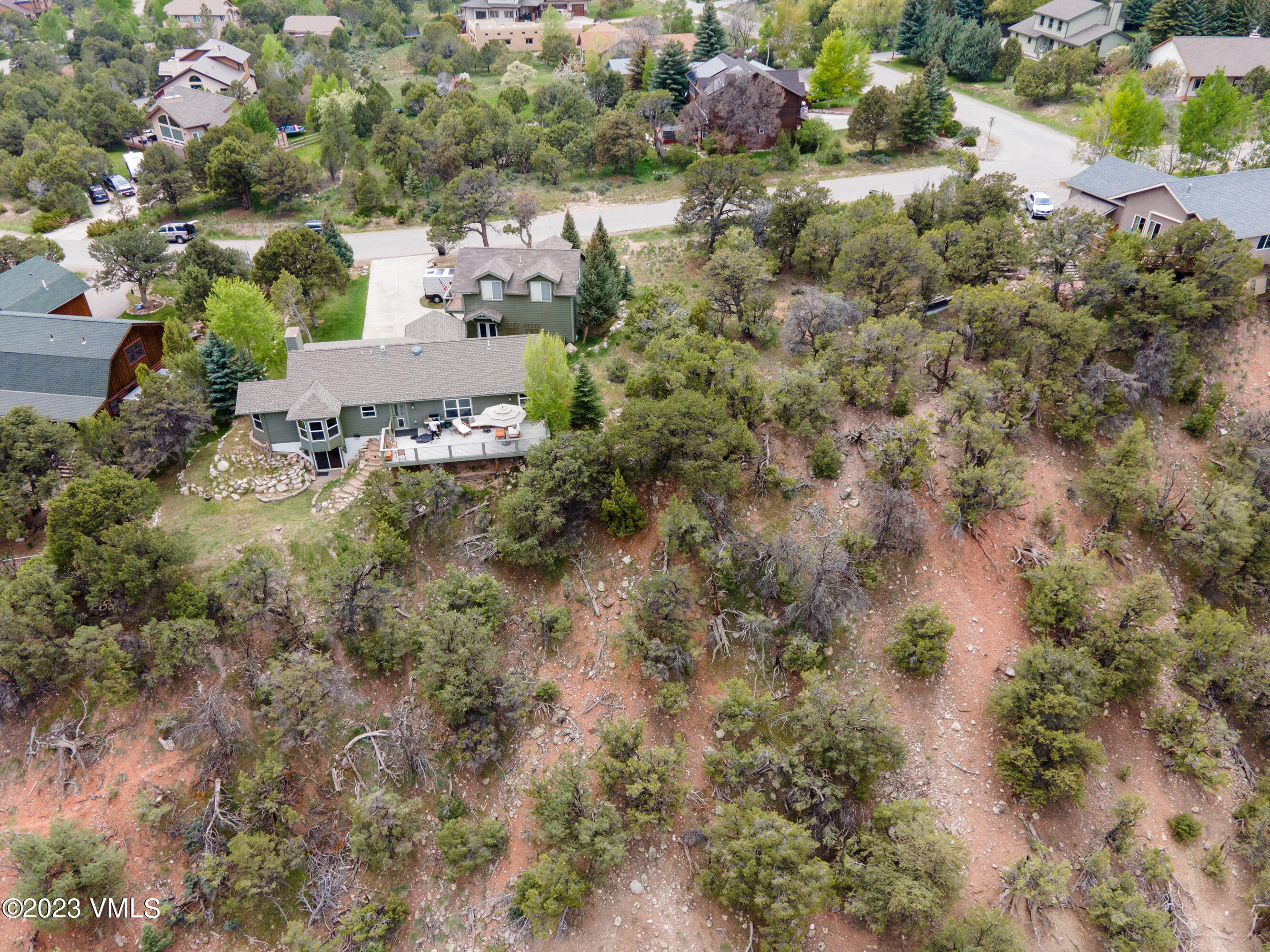 686 Mesa Drive Eagle, CO 81631 - Photo 73 of 73 an aerial view of a house with a yard and covered with trees