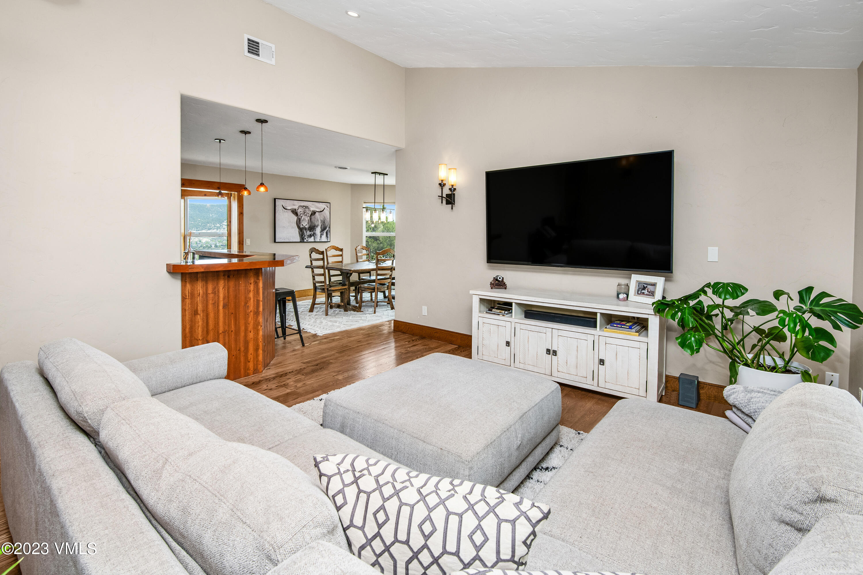 686 Mesa Drive Eagle, CO 81631 - Photo 8 of 73 a living room with furniture and a flat screen tv
