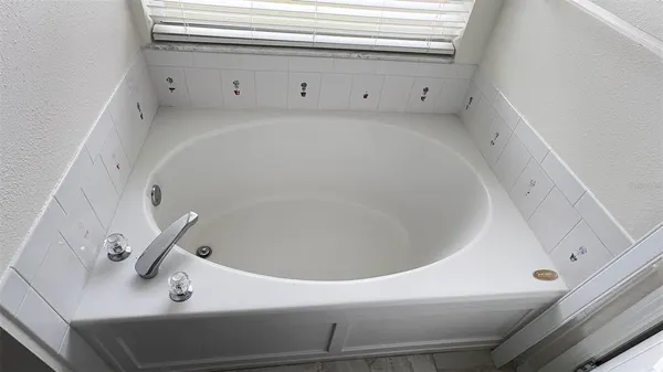 a bathroom with a bathtub