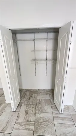 a bathroom with a glass shower door