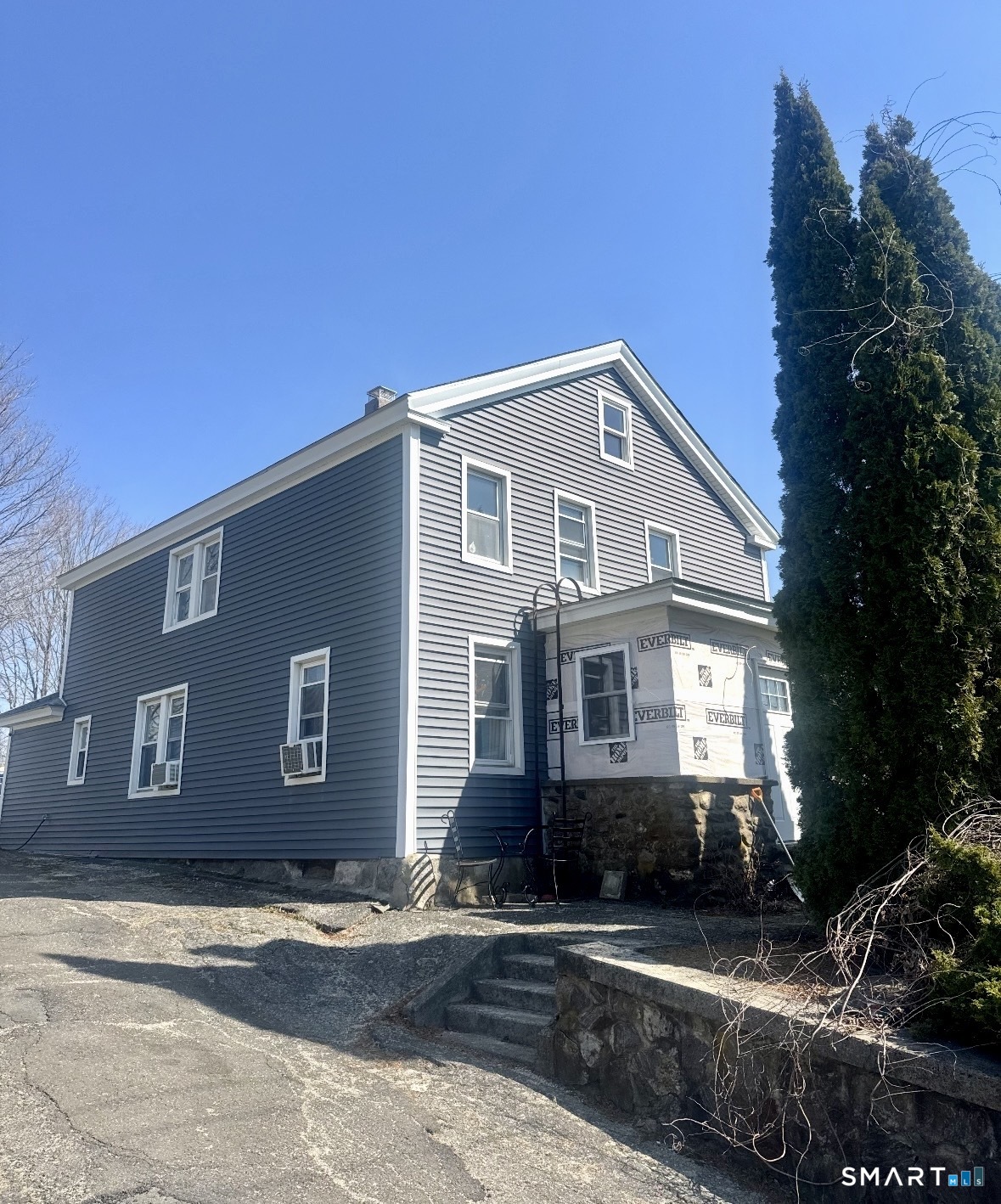 398 Bucks Hill Road Waterbury, CT 06704 - Photo 1 of 1 a front view of a house with a yard