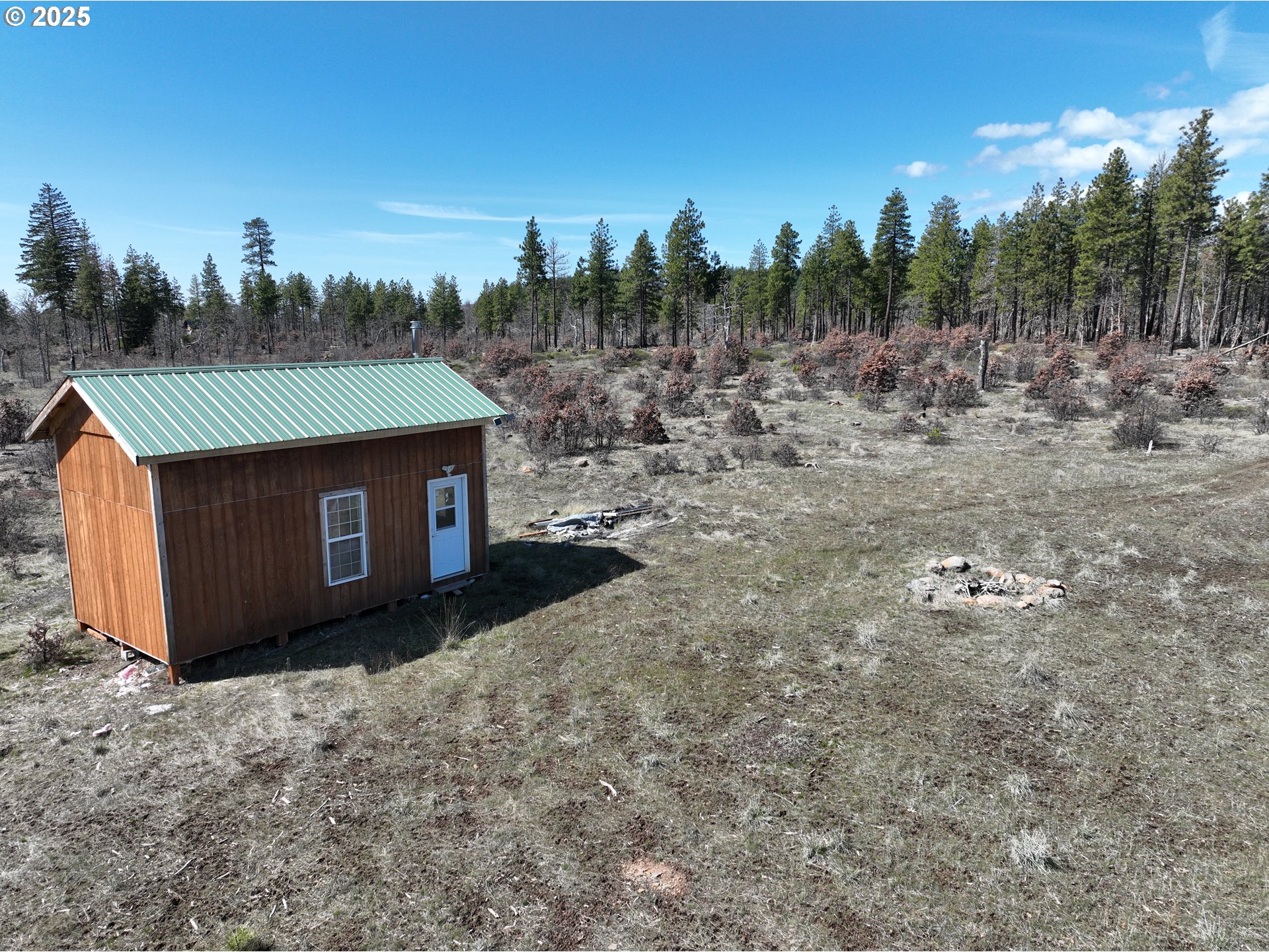 15 Sutherland Trail Goldendale, WA 98620 - Photo 6 of 12 a house view with a backyard space