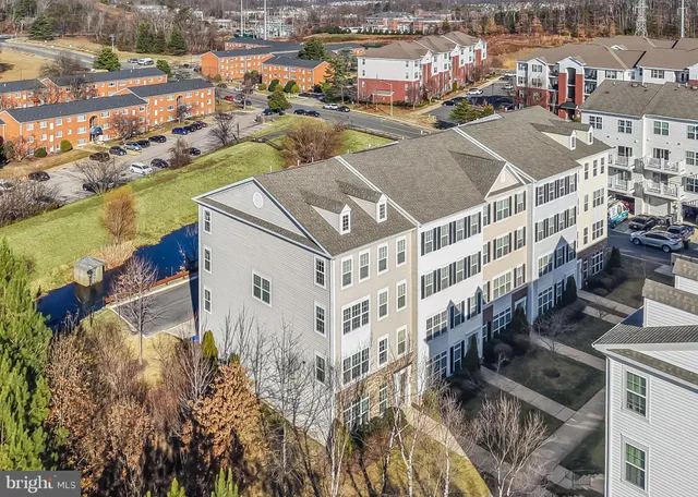 a front view of a building with a lot of windows
