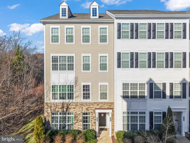 a view of a sign of a park that has a sign on it