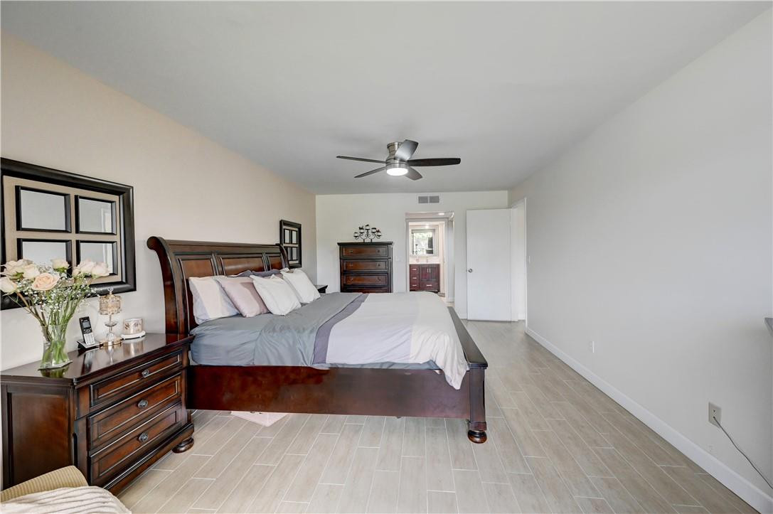 8129 Boca Rio Drive Boca Raton, FL 33433 - Photo 16 of 39 a bed room with a bed and a window