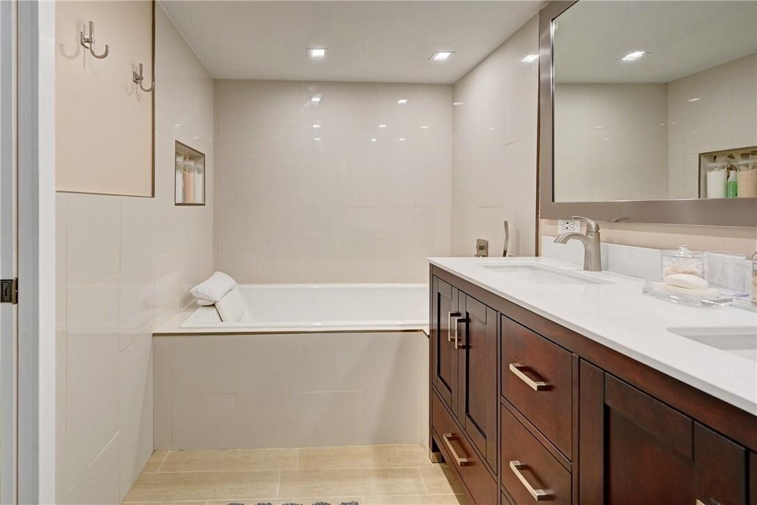 8129 Boca Rio Drive Boca Raton, FL 33433 - Photo 20 of 39 a bathroom with a sink double vanity and a mirror