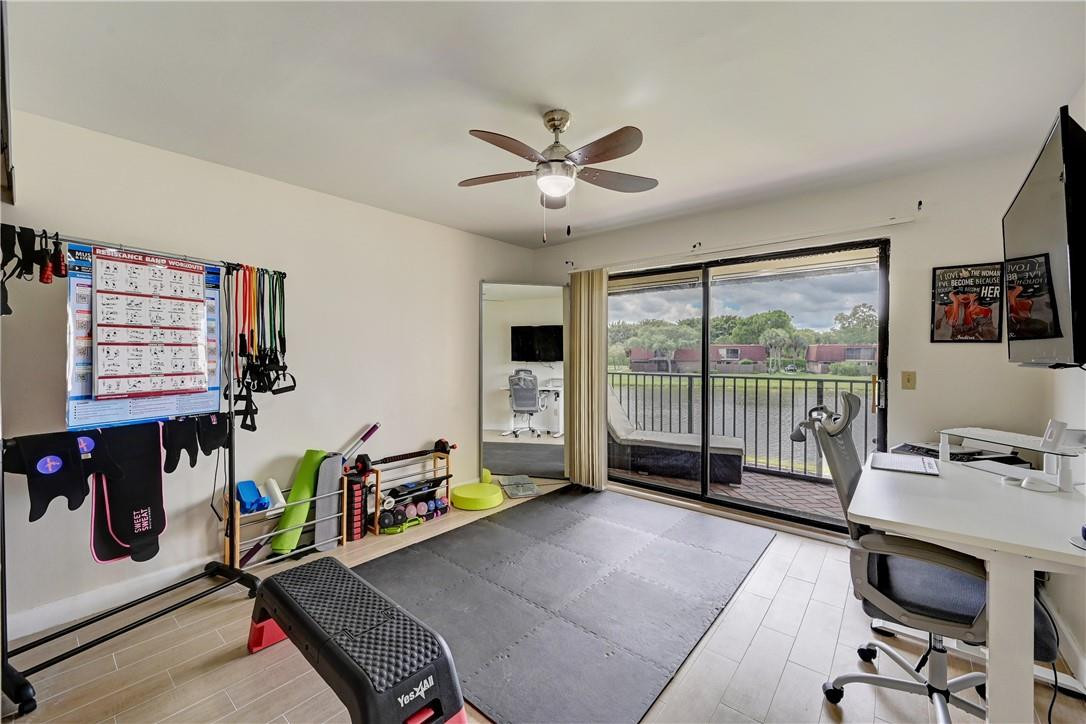 8129 Boca Rio Drive Boca Raton, FL 33433 - Photo 23 of 39 a workspace with furniture and window