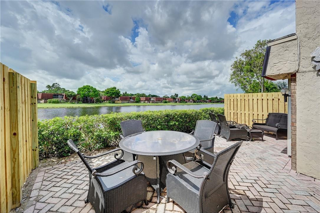 8129 Boca Rio Drive Boca Raton, FL 33433 - Photo 31 of 39 a view of outdoor space yard and patio