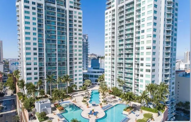 a picture of a bathroom with a shower