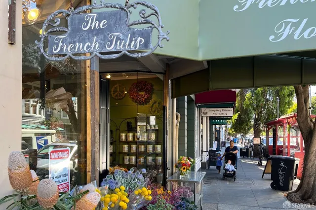 a view of street with sitting area