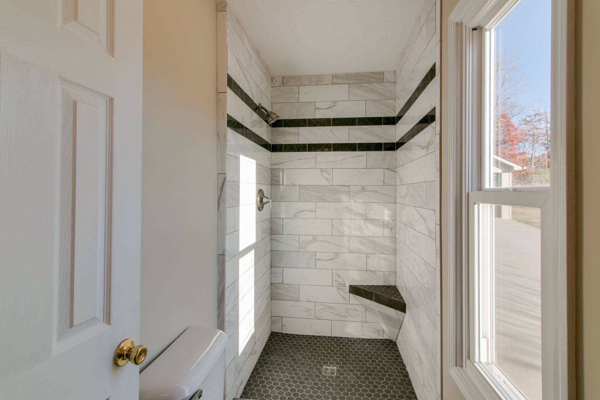 315 Sara Drive Tennessee Ridge, TN 37178 - Photo 14 of 30 a bathroom with a shower