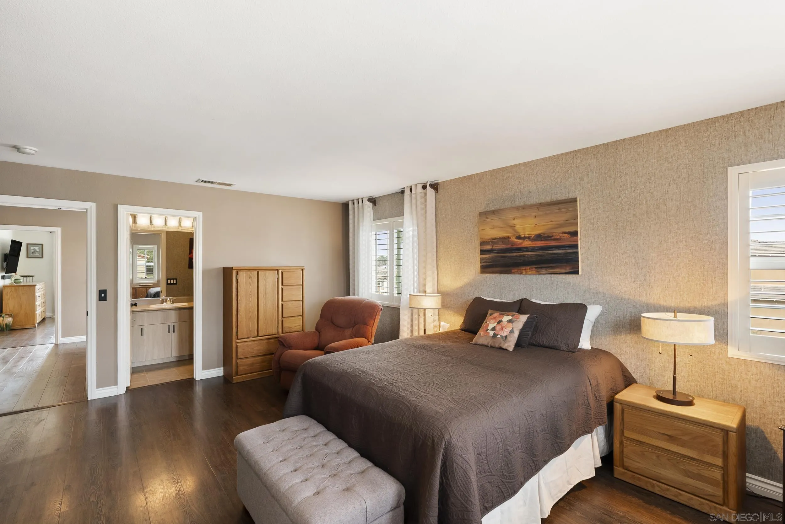 1802 Webber Way Chula Vista, CA 91913 - Photo 31 of 52 a bedroom with a bed and wooden floor