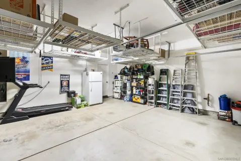 a view of a chairs and table in the patio