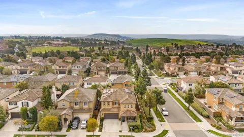 an aerial view of residential building with parking space