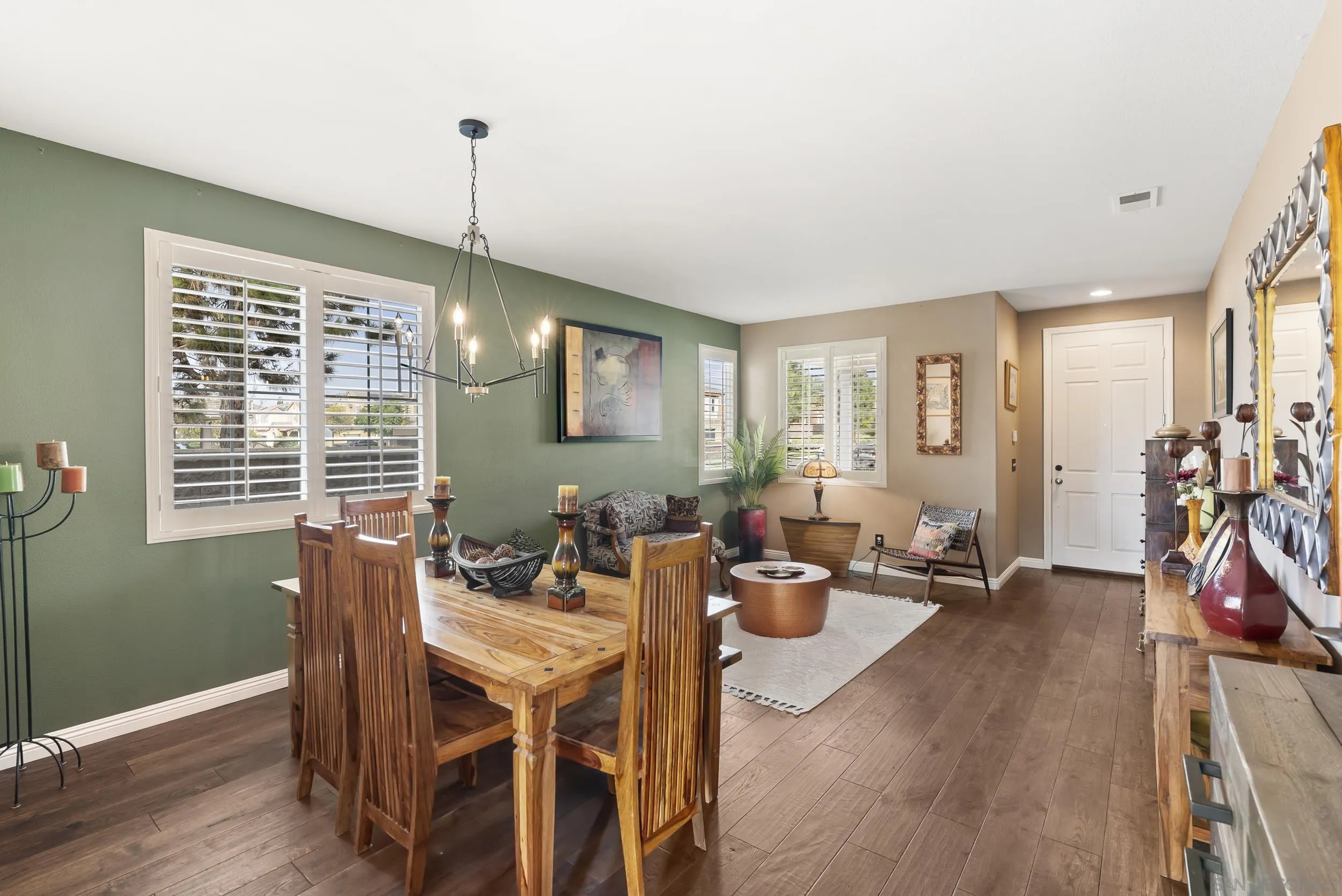 1802 Webber Way Chula Vista, CA 91913 - Photo 10 of 52 a view of a dining room with furniture window and wooden floor