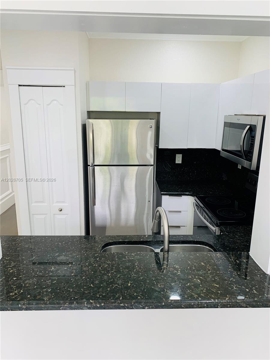 17650 Northwest 73rd Avenue, Unit 202 Hialeah, FL 33015 - Photo 1 of 19