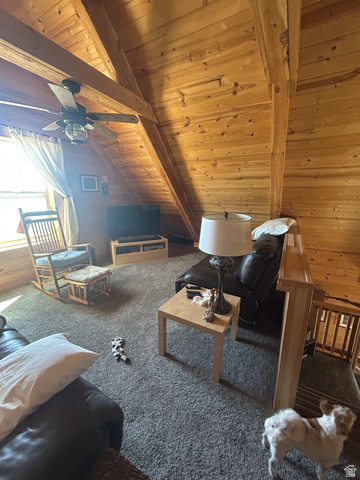 19075 West Honesty Cove Duchesne, UT 84021 - Photo 27 of 44 Vaulted wood-paneled ceilings with exposed wood beams, featuring a ceiling fan with integrated lighting