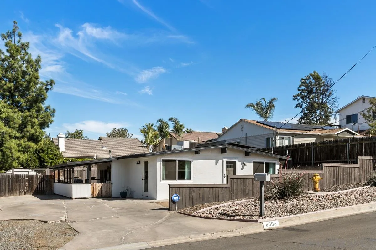 a front view of a house with a porch